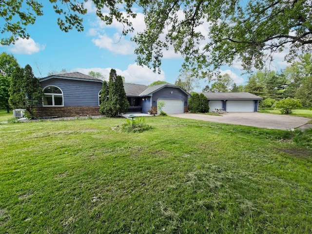 15710 Fox St NW, Andover, MN 55304 - ranch-style house with a front lawn and a garage