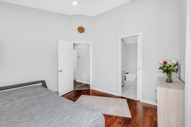 15710 Fox St NW, Andover, MN 55304 - bedroom with baseboards, wood finished floors, and ensuite bathroom
