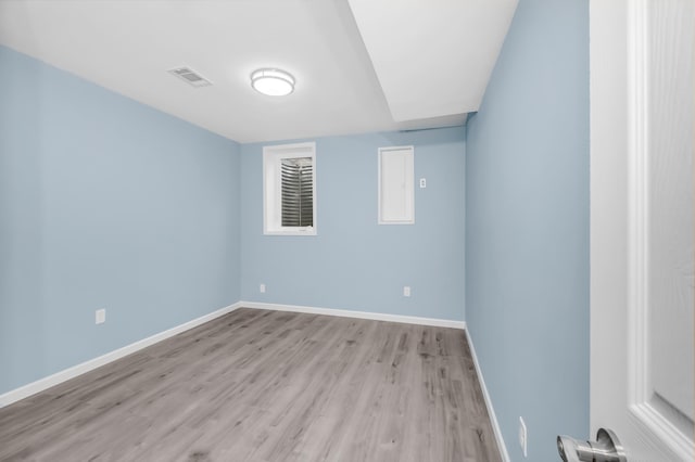 15710 Fox St NW, Andover, MN 55304 - spare room featuring light wood-style flooring and baseboards