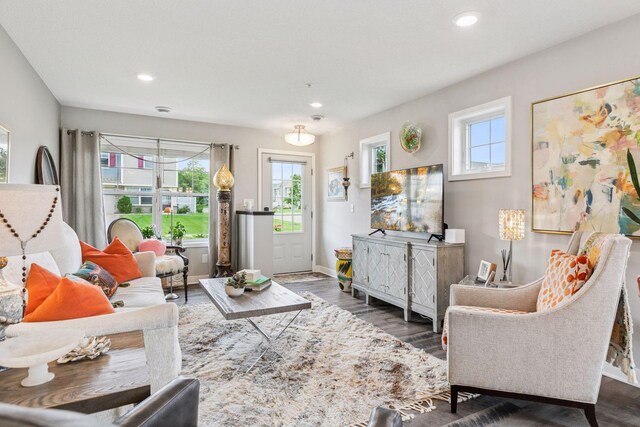 8061 Abercrombie Ln, Woodbury, MN 55129 - living room featuring plenty of natural light, recessed lighting, wood finished floors, and baseboards