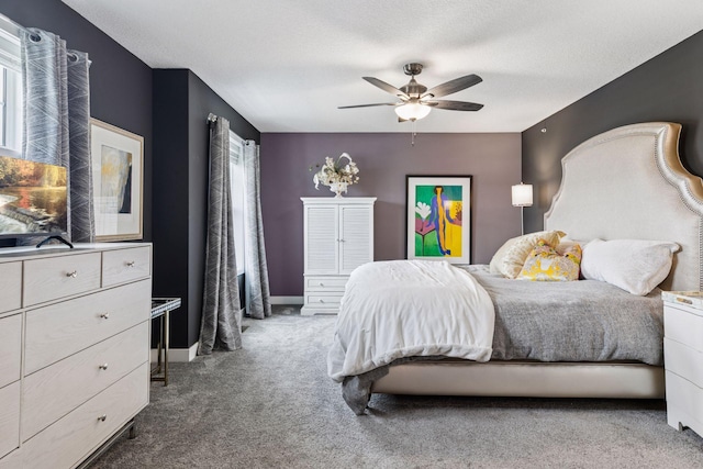 8061 Abercrombie Ln, Woodbury, MN 55129 - bedroom with carpet floors, a ceiling fan, multiple windows, and baseboards