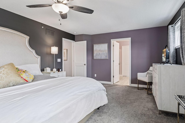 8061 Abercrombie Ln, Woodbury, MN 55129 - carpeted bedroom with baseboards and ceiling fan