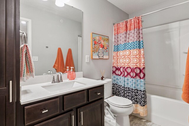 8061 Abercrombie Ln, Woodbury, MN 55129 - full bath with vanity, toilet, shower / tub combo, and wood finished floors