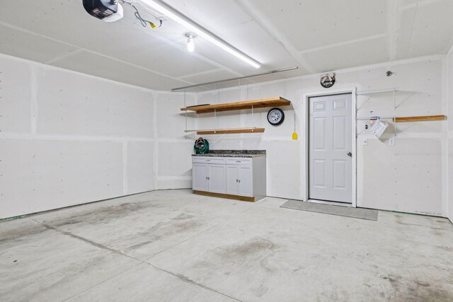 8061 Abercrombie Ln, Woodbury, MN 55129 - garage with a garage door opener