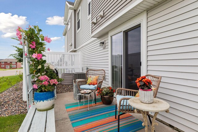 8061 Abercrombie Ln, Woodbury, MN 55129 - view of patio / terrace with central air condition unit