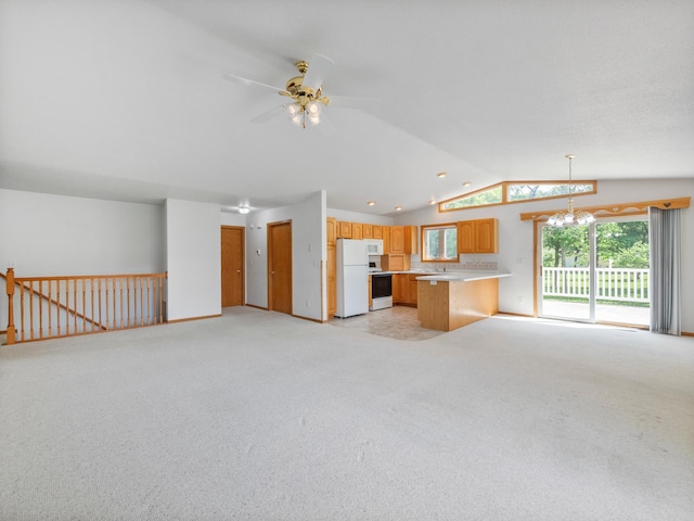 701 Janes Circle Dr SW, Alexandria, MN 56308 - unfurnished living room with vaulted ceiling, light colored carpet, a chandelier, and ceiling fan