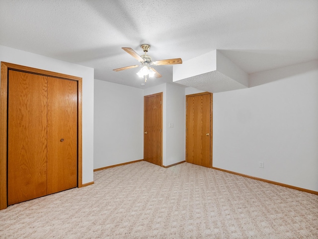 701 Janes Circle Dr SW, Alexandria, MN 56308 - unfurnished bedroom with baseboards, carpet, a ceiling fan, and a closet