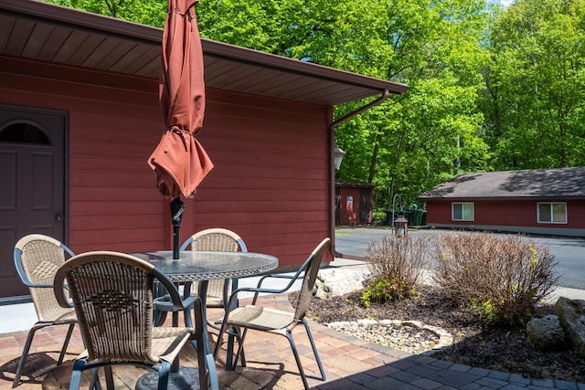 215 Park Dr Unit 4, Balsam Lake, WI 54810 - view of patio featuring outdoor dining space