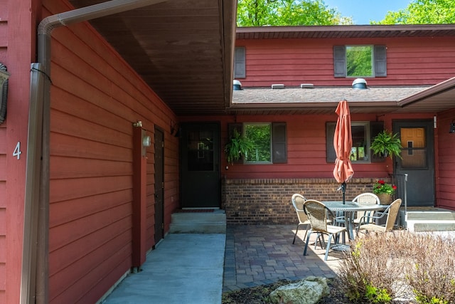 215 Park Dr Unit 4, Balsam Lake, WI 54810 - property entrance with a patio area