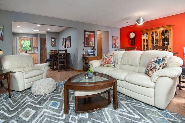 215 Park Dr Unit 4, Balsam Lake, WI 54810 - living room featuring wood finished floors, recessed lighting, and baseboards