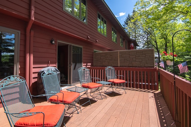 215 Park Dr Unit 4, Balsam Lake, WI 54810 - wooden terrace with a grill