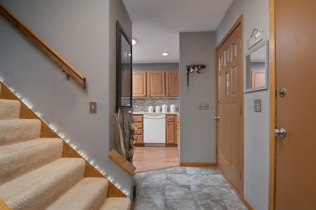 215 Park Dr Unit 4, Balsam Lake, WI 54810 - foyer entrance featuring stairway, recessed lighting, and baseboards