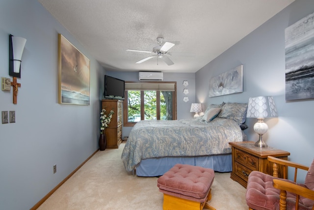 215 Park Dr Unit 4, Balsam Lake, WI 54810 - carpeted bedroom with an AC wall unit, a textured ceiling, baseboards, access to exterior, and a ceiling fan