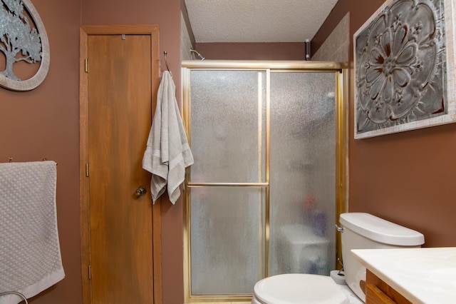 215 Park Dr Unit 4, Balsam Lake, WI 54810 - full bath with toilet, vanity, a stall shower, and a textured ceiling