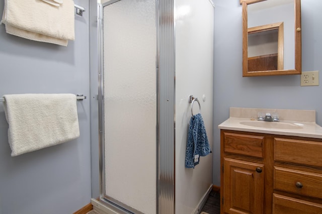 215 Park Dr Unit 4, Balsam Lake, WI 54810 - bathroom featuring vanity and a shower stall