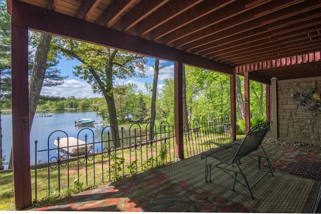 215 Park Dr Unit 4, Balsam Lake, WI 54810 - wooden deck featuring a water view