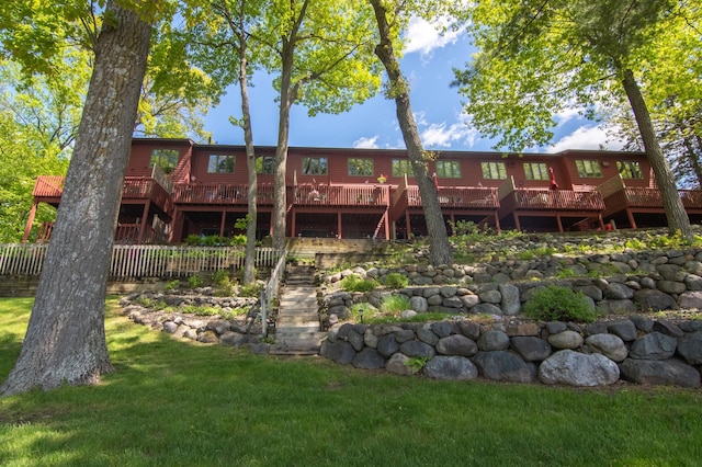 215 Park Dr Unit 4, Balsam Lake, WI 54810 - back of property featuring a wooden deck and stairway