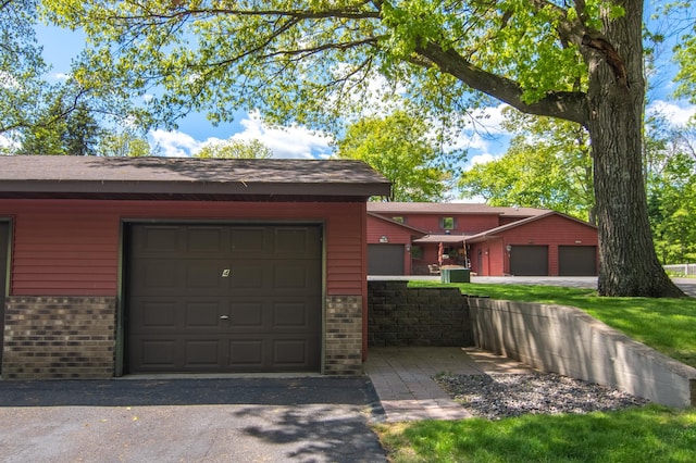 215 Park Dr Unit 4, Balsam Lake, WI 54810 - view of front facade featuring brick siding