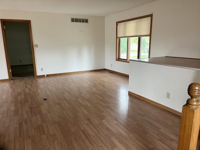 310 8th St, Windom, MN 56101 - spare room with wood finished floors and baseboards