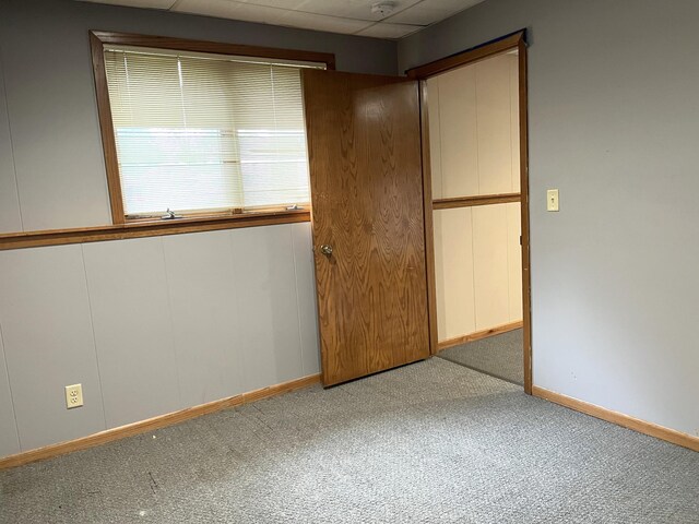 310 8th St, Windom, MN 56101 - unfurnished bedroom with carpet flooring and baseboards