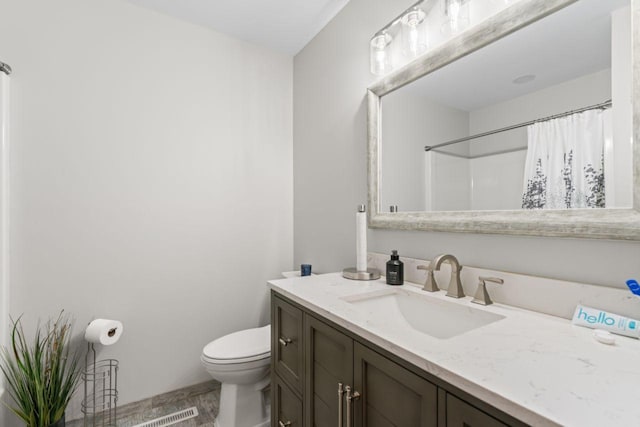 1719 Buckingham Path, Faribault, MN 55021 - bathroom with vanity, toilet, curtained shower, and wood finished floors