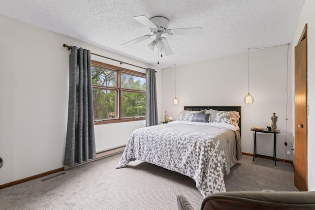 1719 Buckingham Path, Faribault, MN 55021 - carpeted bedroom with a textured ceiling, baseboards, ceiling fan, and a baseboard radiator