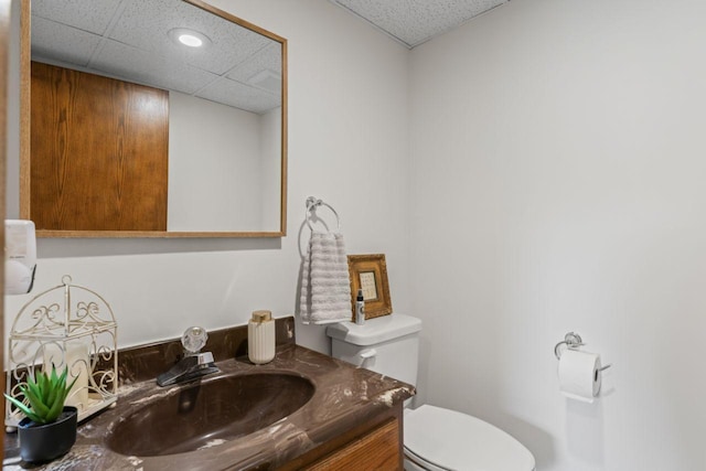 1719 Buckingham Path, Faribault, MN 55021 - half bath featuring toilet, vanity, recessed lighting, and a drop ceiling