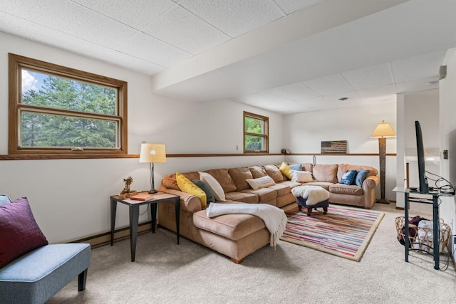 1719 Buckingham Path, Faribault, MN 55021 - carpeted living area featuring a paneled ceiling and baseboard heating