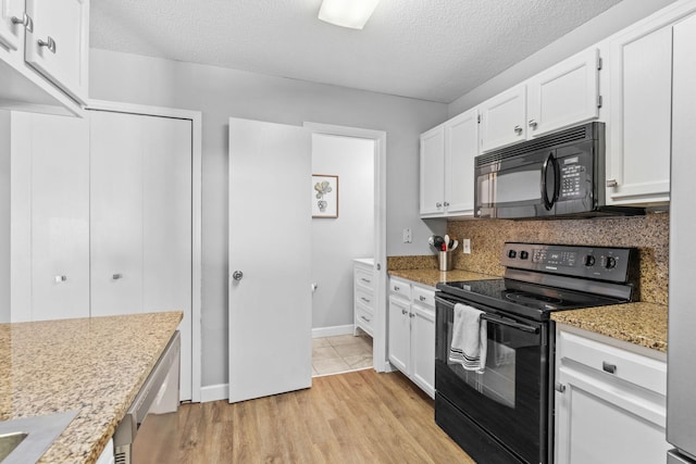 11427 Elmwood Ave N, Champlin, MN 55316 - kitchen with black appliances, white cabinetry, backsplash, a textured ceiling, and light wood-style floors