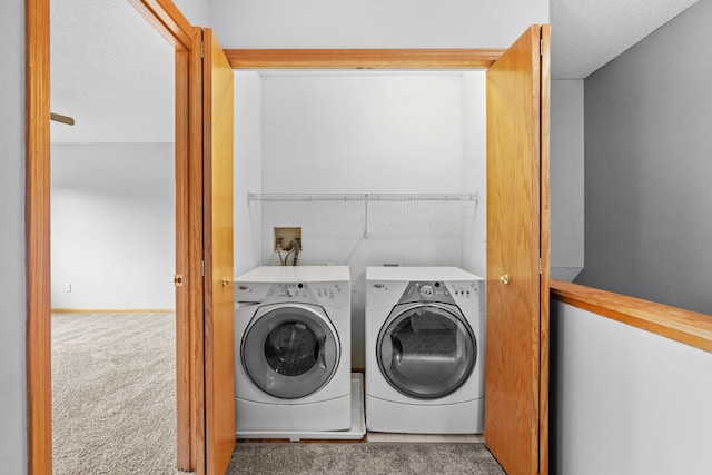 11427 Elmwood Ave N, Champlin, MN 55316 - laundry area with separate washer and dryer and carpet flooring