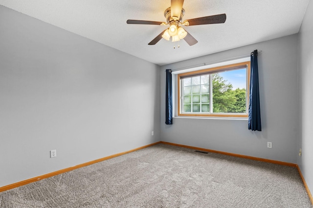 11427 Elmwood Ave N, Champlin, MN 55316 - empty room with carpet and a ceiling fan