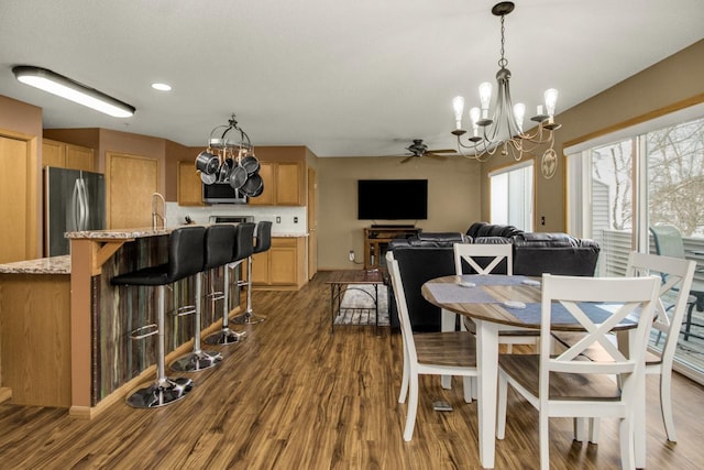 11167 16th St NE, Saint Michael, MN 55376 - dining space featuring a chandelier, dark wood-type flooring, and ceiling fan