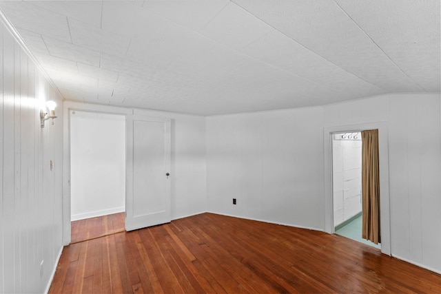 4129 7th St NE, Columbia Heights, MN 55421 - unfurnished bedroom with hardwood / wood-style floors