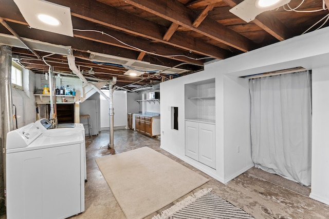 4129 7th St NE, Columbia Heights, MN 55421 - below grade area featuring washer and dryer