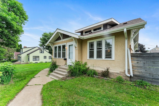 4129 7th St NE, Columbia Heights, MN 55421 - bungalow-style house with stucco siding