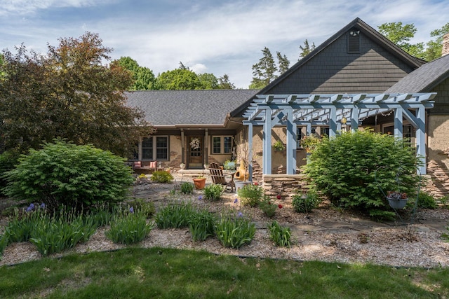 56273 185th Ln, Rapidan Twp, MN 56037 - view of front of property with a pergola and roof with shingles