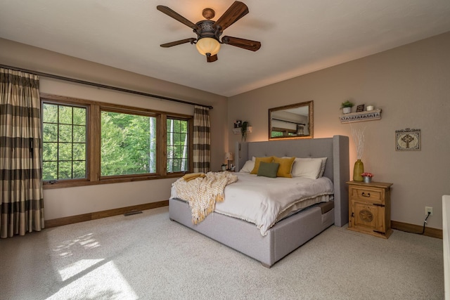 56273 185th Ln, Rapidan Twp, MN 56037 - carpeted bedroom featuring baseboards and a ceiling fan