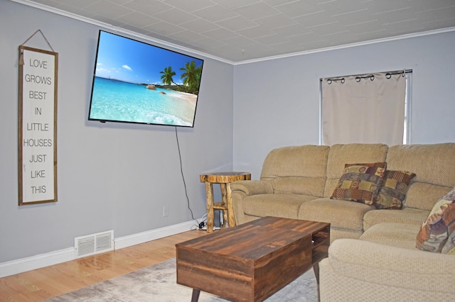 630 Oak St, Crosby, MN 56441 - living room with wood finished floors, crown molding, and baseboards