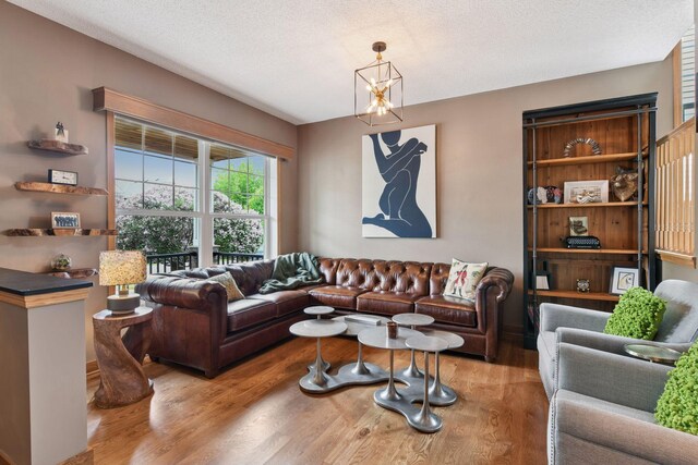 2392 Molnau Ct, Chaska, MN 55318 - living room featuring wood finished floors and a textured ceiling