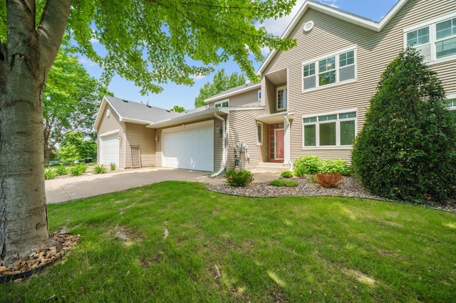 1106 Shumway Ct, Faribault, MN 55021 - traditional-style house with an attached garage, driveway, and a front yard