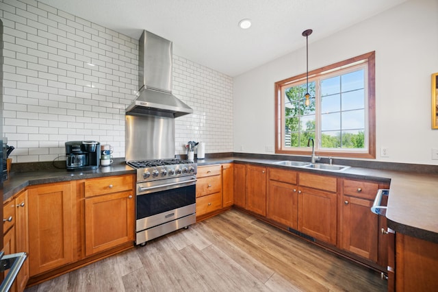 1106 Shumway Ct, Faribault, MN 55021 - kitchen with island range hood, designer range, a sink, dark countertops, and decorative backsplash