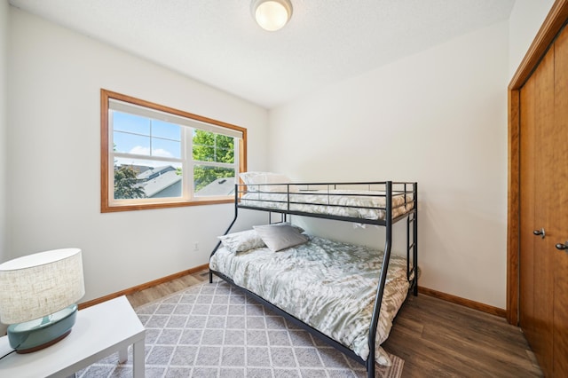 1106 Shumway Ct, Faribault, MN 55021 - bedroom with light wood-style floors and baseboards