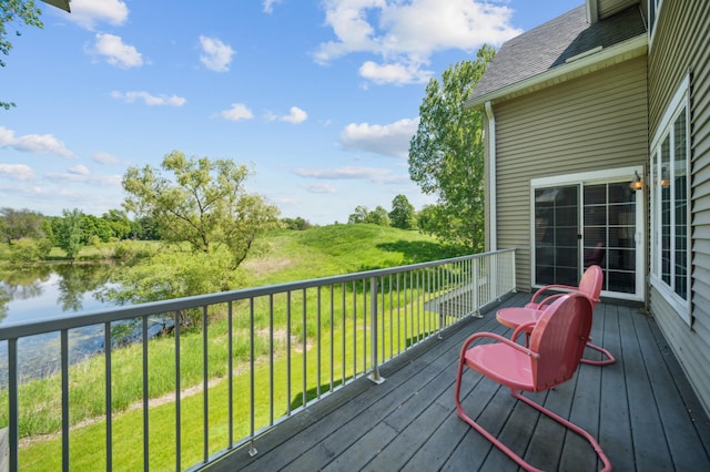 1106 Shumway Ct, Faribault, MN 55021 - wooden deck featuring a water view and a yard