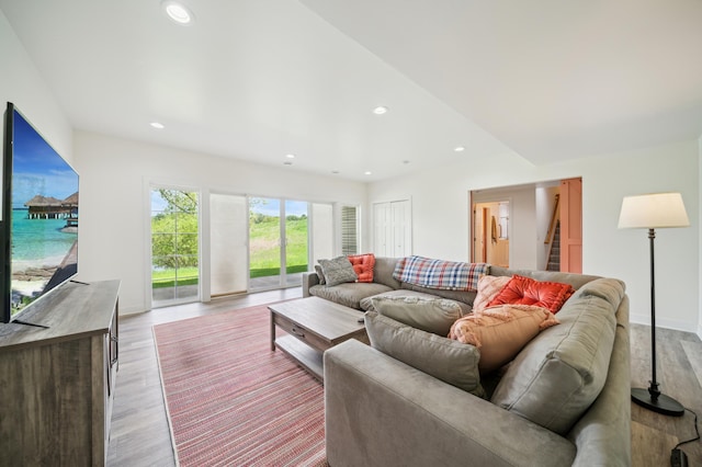 1106 Shumway Ct, Faribault, MN 55021 - living area featuring light wood-type flooring, recessed lighting, and stairs