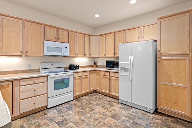 15440 Eminence Ave N Unit 2, Hugo, MN 55038 - kitchen with white appliances, light brown cabinets, recessed lighting, light countertops, and stone finish floors