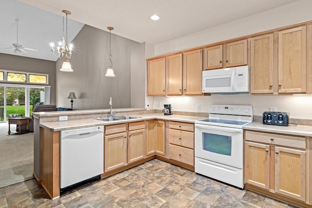 15440 Eminence Ave N Unit 2, Hugo, MN 55038 - kitchen with white appliances, light brown cabinets, a sink, a peninsula, and lofted ceiling