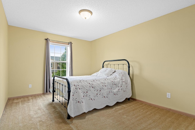 15440 Eminence Ave N Unit 2, Hugo, MN 55038 - carpeted bedroom featuring baseboards and a textured ceiling