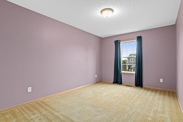 15440 Eminence Ave N Unit 2, Hugo, MN 55038 - carpeted empty room with a textured ceiling and baseboards