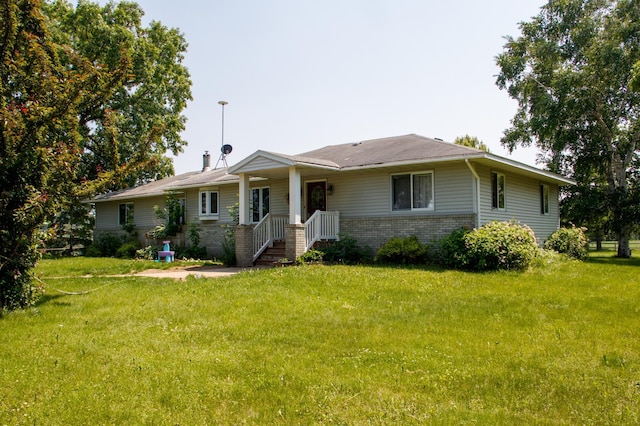 44818 215th Ave, Staples Twp, MN 56479 - view of front facade featuring brick siding and a front yard