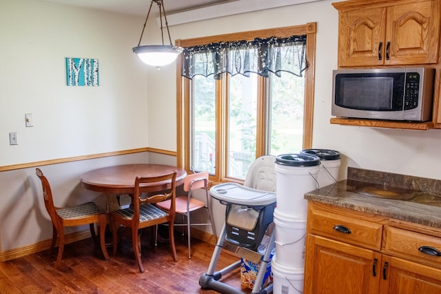 44818 215th Ave, Staples Twp, MN 56479 - dining area with healthy amount of natural light and wood finished floors